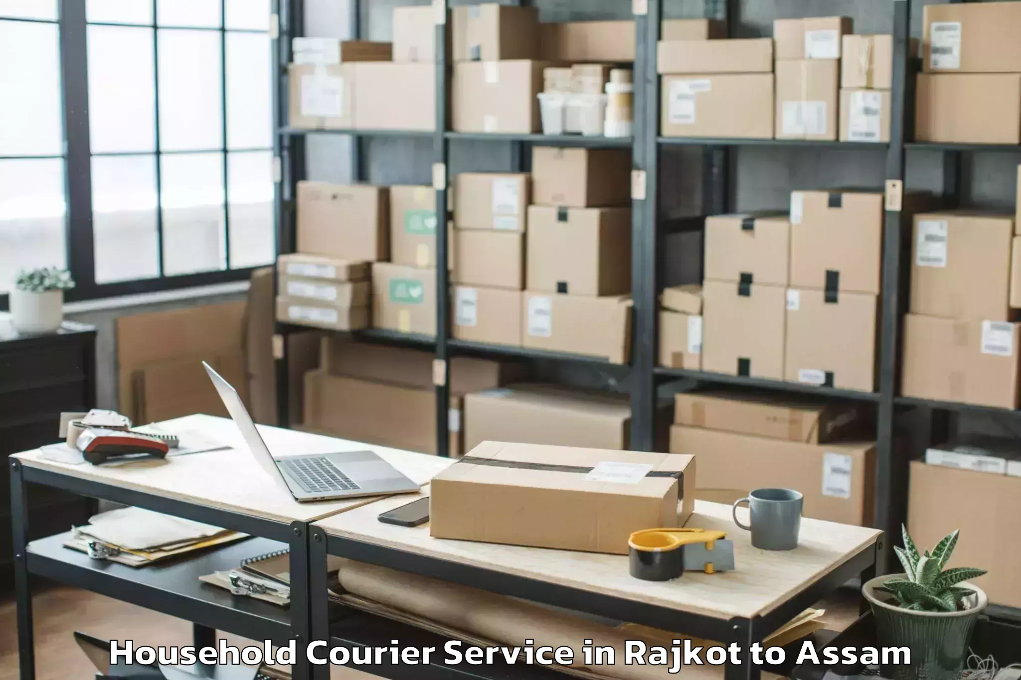 Hassle-Free Rajkot to Kharupetia Household Courier